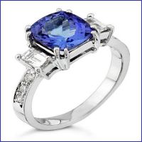 platinum ring with diamonds and sapphire center